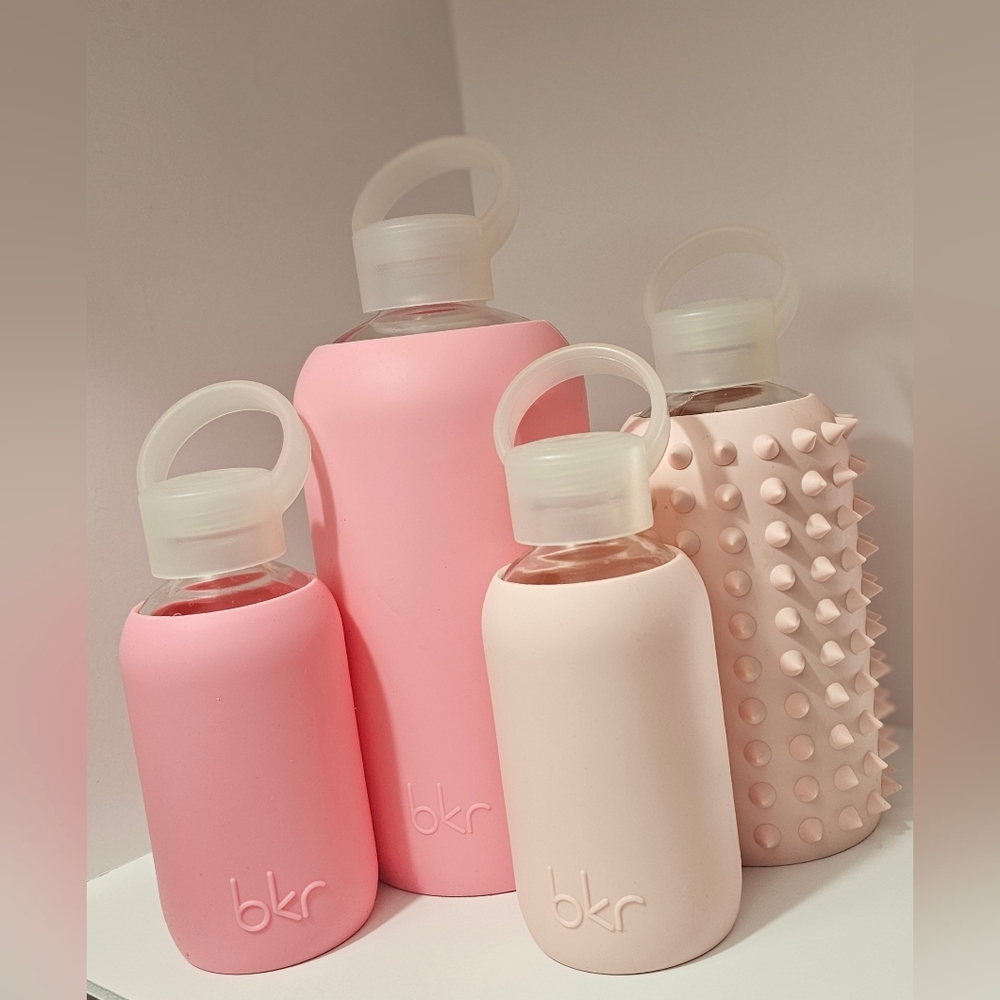 BKR set of glass bottles with silicone sleeves and caps.